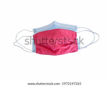Wear two protective masks at the same time. On a isolated white background 