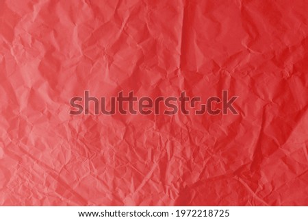 Red wrinkled paper patterned background