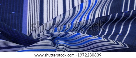silk fabric, blue background with striped pattern of white and purple lines, mexican theme, mexican poncho costumes. Texture pattern, collection,