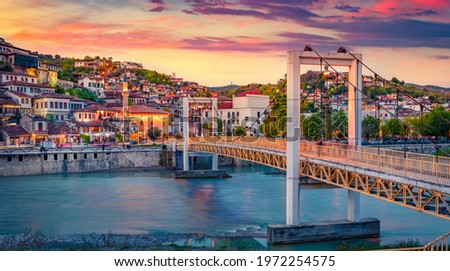 Amazing evening cityscape of Berat town. Splenedid spring sunset in Albania. Traveling concept background. Royalty-Free Stock Photo #1972254575