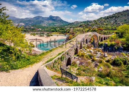 Amazing spring view of Old Mes Bridge. Stunning morning landscape of Shkoder. Picturesque outdoor scene of Albania, Europe. Traveling concept background.
 Royalty-Free Stock Photo #1972254578