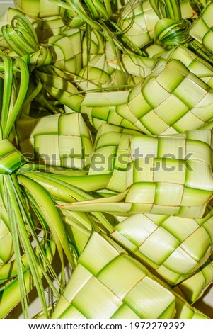 Ketupat or rice dumplings are a local specialty during the Eid celebration season. Ketupat, a natural rice container made from young coconut leaves for cooking rice.