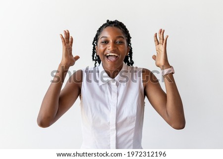 Happy black woman portrait shoot in a studio