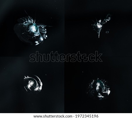 four diffrent macro shots of stone chip in a cars windscreen Royalty-Free Stock Photo #1972345196