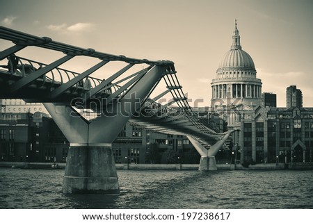 St Paul's cathedral in London and bridge over Thames River. 