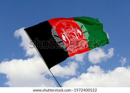 Afghanistan flag isolated on sky background with clipping path. close up waving flag of Afghanistan. flag symbols of Afghanistan.