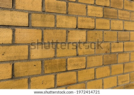 yellow red colored Clinker brick wall and facade, facing brick. yellow red brick clinker textures.