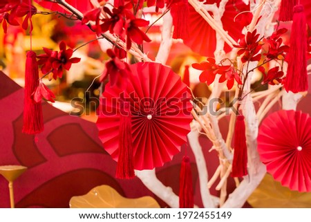 Chinese paper fans in pastel colors on wedding
