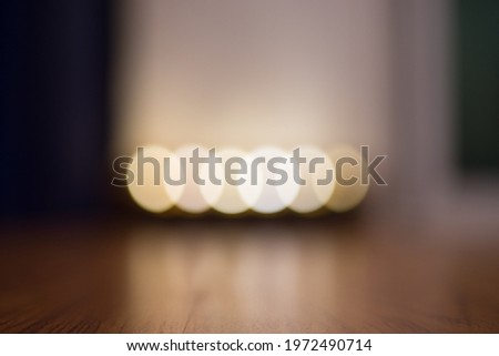candle light blurred background , warm ambiance, use for background such as yoga studio product