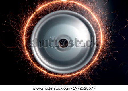 long exposure photography in motion spinning car titanium rims in blurry light