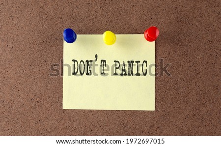 Don't panic text written on the Message Board.