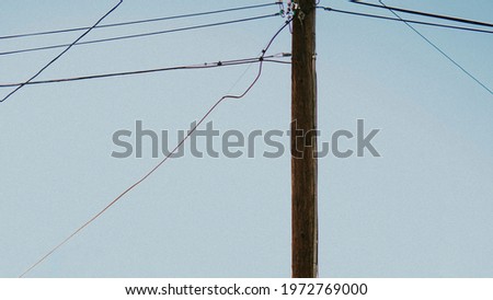 Messy electricty lines in the blue sky