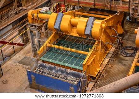 Vibrating screen, machine for grading bulk materials by size and size. Royalty-Free Stock Photo #1972771808