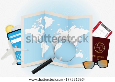 Travel destination Seychelles, tourism mockup with travel equipment and world map with magnifying glass on a Seychelles. Trip template.
