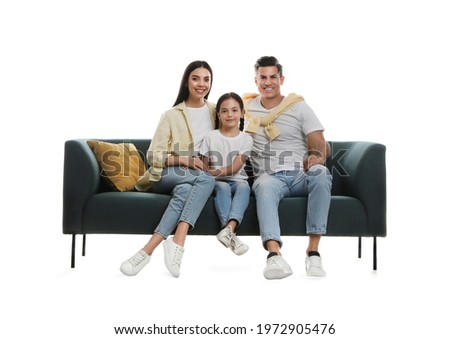 Happy family resting on comfortable green sofa against white background