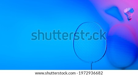 Badminton racket and shuttlecock in vibrant bold gradient holographic neon colors