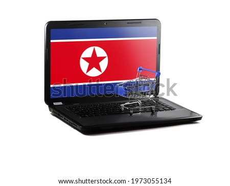 Isolated on white background laptop with North Korea flag on display, online shopping sale concept
