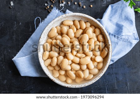 white beans cooked ready to eat bean boiled legumes on the table healthy food meal snack copy space food background rustic. top view keto or paleo diet Royalty-Free Stock Photo #1973096294