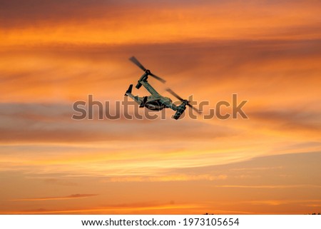The Osprey flying at the the Oregon International Air Show.  The Osprey is an American multi-mission, tiltrotor military aircraft with both vertical takeoff and landing Royalty-Free Stock Photo #1973105654
