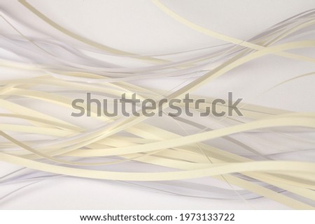 Abstract white and yellow color strip wave paper on light background.