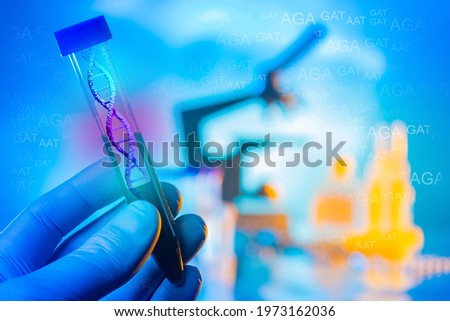 Genetic tests. Laboratory test tube with a picture of DNA. Abbreviations of hereditary diseases. The study of human genetic characteristics. Chromosomal analysis.