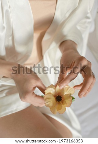 Beautiful bride accessories. Wedding details. Bouquet. A lot of  yellow flowers.  Earrings with pearls. Classic style hotel. Spring mood.  Fashionable and expensive decor. Sensitive and nice pictures