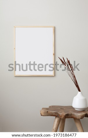 16x20 thin wood picture frame mockup with bohemian style props.