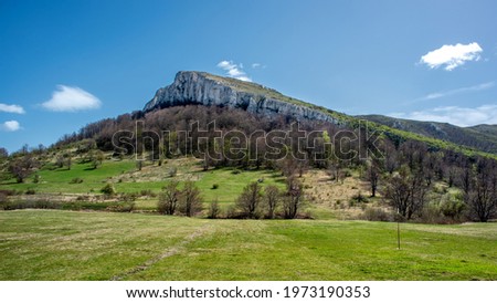 Jagged peak of Stol mountain in eastern Serbia, near the city of Bor Royalty-Free Stock Photo #1973190353