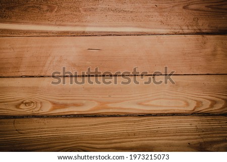 Brown board background close-up, brown board background and vignette. Wooden background