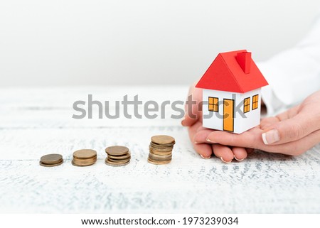 Lady Presenting New Home Savings Deals In Outfit, Business Woman Showing Possible Investment Oppurtiunities For New House, Mortegage Installments Exhibits For Recent Apartments Sales