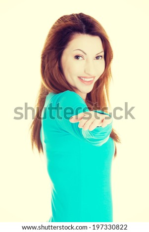 Happy , excited woman presenting copy space on her palm