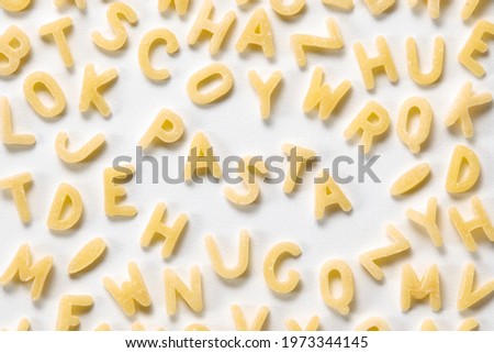 Alphabet pasta, also referred to as alfabeto and alphabetti spaghetti in the UK, It is a pasta that has been mechanically cut or pressed into the letters of the alphabet.  Royalty-Free Stock Photo #1973344145