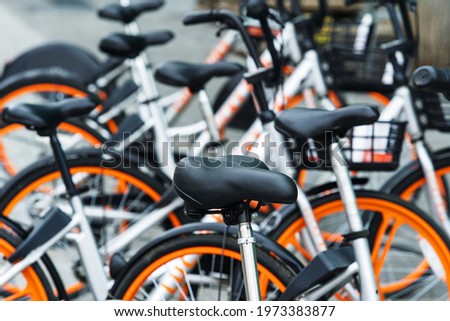 Bicycle rental on a city street. Close-up
