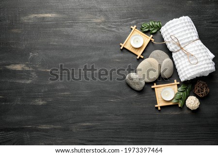 Beautiful spa composition on dark wooden background