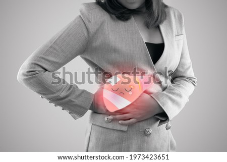 Illustration sick liver on woman's body against gray background, Hepatitis, Concept with healthcare and medicine Royalty-Free Stock Photo #1973423651