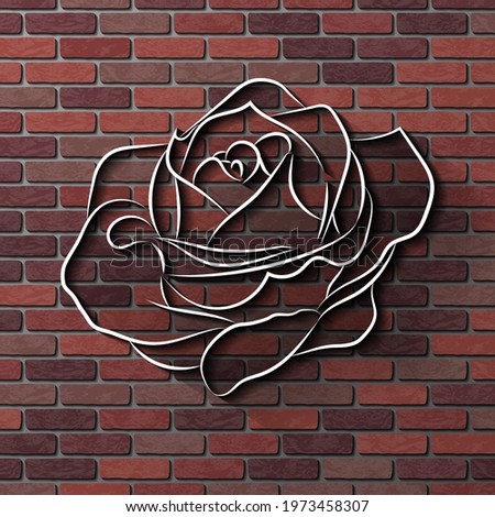 A rose on a brick wall. Abstract vector illustration of a fragment of a brick wall with a bas-relief of a rose. A blank for creativity.