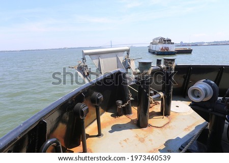 These are photos of a tugboat. 