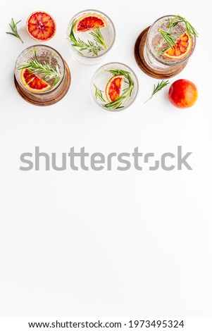 Citrus juice and slices of grapefruit and red oranges. Overhead view