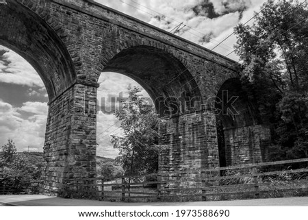 Detailed photograph of Esholt Viaduct, Leeds using HDR techniques. Black and white edit.