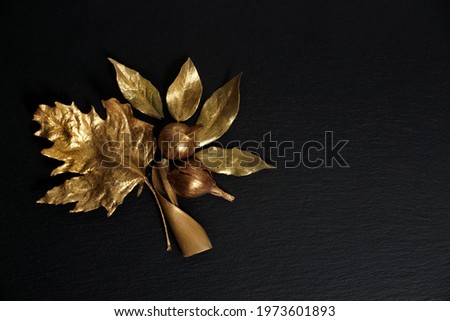 Golden leaf. Golden leaves on black background. Gold   