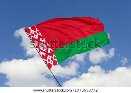 Belarus flag isolated on sky background with clipping path. close up waving flag of Belarus. flag symbols of Belarus.