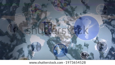 Composition of network of connections with icons over winter landscape. global connections and networking concept digitally generated image.
