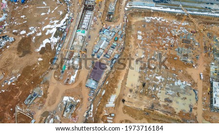 Aerial view of large construction site. Building new apartment blocks in residential area.