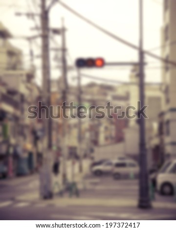Blurred Street with traffic light Japan Urban scene Background Vintage tone