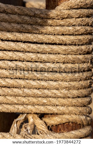An abstract photo of rope tied around a post taken on may 7th 2021