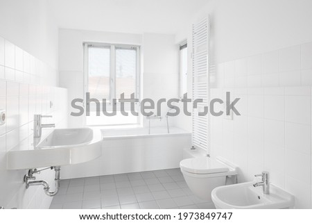 white bathroom - modern bath bathtub Royalty-Free Stock Photo #1973849747