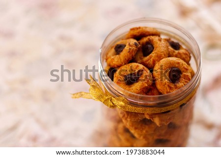 Selected Focus, noise picture of cookies in a jar.