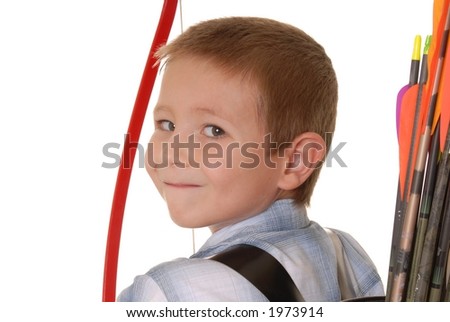 Young boy with bow and arrow practicing archery Royalty-Free Stock Photo #1973914