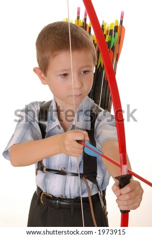 Young boy with bow and arrow practicing archery Royalty-Free Stock Photo #1973915