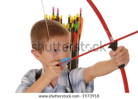 Young boy with bow and arrow practicing archery Royalty-Free Stock Photo #1973918